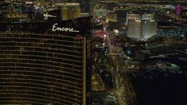 4K aerial stock footage of flying by Encore, revealing hotels along Las Vegas Boulevard, Nevada Night Aerial Stock Footage | DCA03_173