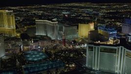 4K aerial stock footage of approaching The Venetian Resort and Casino, Las Vegas, Nevada Night Aerial Stock Footage | DCA03_183