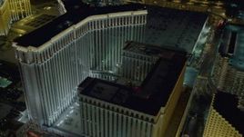 4K aerial stock footage of approaching and orbiting The Venetian Resort and Casino, Las Vegas, Nevada Night Aerial Stock Footage | DCA03_184