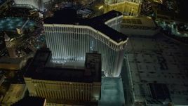 4K aerial stock footage of orbiting the back of The Venetian Resort and Casino, Las Vegas, Nevada Night Aerial Stock Footage | DCA03_185