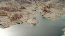4K aerial stock footage of flying away from a bay in Lake Mead, Las Vegas, Nevada Aerial Stock Footage | DCA04_017