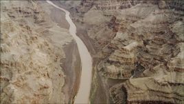 4K aerial stock footage tilt from a bird's eye view of Colorado River in Grand Canyon, Arizona Aerial Stock Footage | DCA04_025