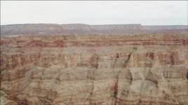 4K aerial stock footage of panning across jagged cliff faces in Grand Canyon, Arizona Aerial Stock Footage | DCA04_034