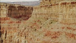 4K aerial stock footage of passing a sheer cliff in Grand Canyon, Arizona Aerial Stock Footage | DCA04_038