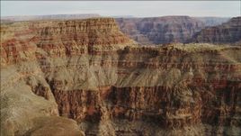 4K aerial stock footage of flying by a rock formation in Grand Canyon, Arizona Aerial Stock Footage | DCA04_041