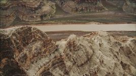 4K aerial stock footage of flying by a rock formation in Grand Canyon, Arizona Aerial Stock Footage | DCA04_044