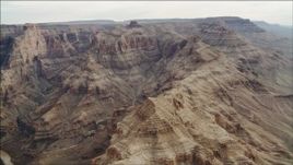 4K aerial stock footage of flying by rock formations in Grand Canyon, Arizona Aerial Stock Footage | DCA04_054
