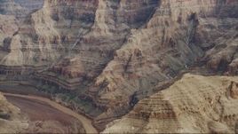 4K aerial stock footage of rock formations near Colorado River in Grand Canyon, Arizona Aerial Stock Footage | DCA04_055