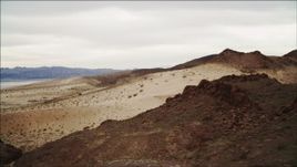 4K aerial stock footage of flying over sandy dunes near Lake Mead, Nevada Aerial Stock Footage | DCA04_088