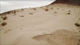 4K aerial stock footage of flying over sandy dunes near Lake Mead, Nevada Aerial Stock Footage | DCA04_089