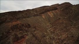 4K aerial stock footage of flying over a mountain ridge near Lake Mead, Nevada Aerial Stock Footage | DCA04_091