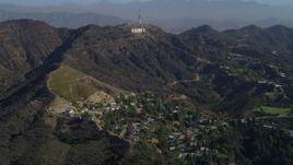 4K aerial stock footage of flying over Hollywood Hills, approaching Hollywood Sign, Los Angeles, California Aerial Stock Footage | DCA05_004