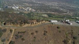 4K aerial stock footage of Hollywood Hills, Hollywood Sign, Forest Lawn Memorial Park, Los Angeles, California Aerial Stock Footage | DCA05_009