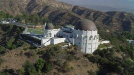 4K aerial stock footage of orbiting the Griffith Observatory, south side, Los Angeles, California Aerial Stock Footage | DCA05_013