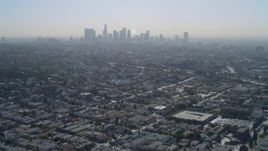 4K aerial stock footage of approaching Downtown skyline, from Hollywood, Los Angeles, California Aerial Stock Footage | DCA05_022