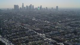 4K aerial stock footage of flying over Highway 101, revealing Downtown skyline, Los Angeles, California Aerial Stock Footage | DCA05_023