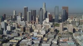 4K aerial stock footage of East 4th Street, tilt to reveal Downtown skyline, Los Angeles, California Aerial Stock Footage | DCA05_031