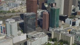 4K aerial stock footage of flying by Downtown skyscrapers, high-rise buildings, Los Angeles, California Aerial Stock Footage | DCA05_049