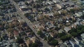 4K aerial stock footage of Pico-Union residential neighborhood, reveal Interstate 10, Los Angeles, California Aerial Stock Footage | DCA05_054