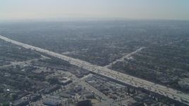 4K aerial stock footage of tilting from Washington Boulevard, reveal Interstate 405, Culver City, California Aerial Stock Footage | DCA05_061