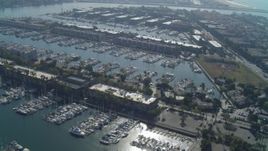 4K aerial stock footage of flying by boats in the marina, Marina Del Rey, California Aerial Stock Footage | DCA05_065