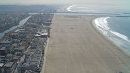 4K aerial stock footage of flying by Ballona Lagoon, homes and coastal beach; Marina Del Rey, California Aerial Stock Footage | DCA05_074