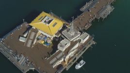 4K aerial stock footage of Santa Monica Pier, reveal beach, circus tents, Santa Monica, California Aerial Stock Footage | DCA05_088