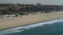 4K aerial stock footage of flying by Santa Monica State Beach, Santa Monica, California Aerial Stock Footage | DCA05_095