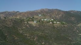 4K aerial stock footage pan across hills, upscale homes, Malibu, California Aerial Stock Footage | DCA05_112