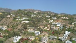 4K aerial stock footage of flying by hillside homes, Malibu, California Aerial Stock Footage | DCA05_116