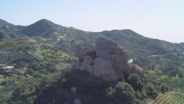4K aerial stock footage of orbiting hilltop rock formation, Malibu, California Aerial Stock Footage | DCA05_135