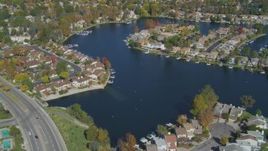 4K aerial stock footage of flying over homes surrounding Westlake Lake, Westlake Village, California Aerial Stock Footage | DCA05_143