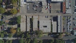 4K aerial stock footage of a bird's eye view flying over commercial buildings and streets, Canoga Park, California Aerial Stock Footage | DCA05_164