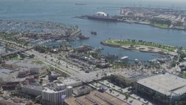 4K aerial stock footage fly over restaurants, approaching Queen Mary, Downtown Long Beach, California Aerial Stock Footage | DCA06_021