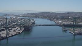 4K aerial stock footage of approaching Vincent Thomas Bridge between Port of Los Angeles and San Pedro, California Aerial Stock Footage | DCA06_045