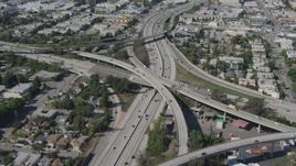 4K aerial stock footage tilt to bird's eye view of light traffic on freeway interchange, Mar Vista, California Aerial Stock Footage | DCA06_066
