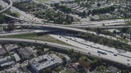 4K aerial stock footage of flying away from Interstate 405 and Interstate 10 interchange, Mar Vista, California Aerial Stock Footage | DCA06_067