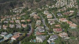 4K aerial stock footage of approach and orbit mansions in Bel Air, California Aerial Stock Footage | DCA06_071