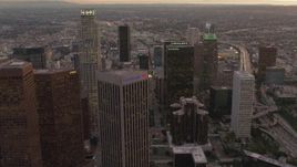 4K aerial stock footage of flying by Downtown Los Angeles skyscrapers, California, sunset Aerial Stock Footage | DCA07_007