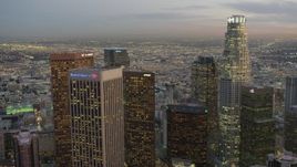 4K aerial stock footage of flying by Downtown, revealing southeast districts, Los Angeles, California, twilight Aerial Stock Footage | DCA07_023