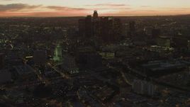 4K aerial stock footage of approaching Los Angeles City Hall, revealing Downtown skyline, Los Angeles, California, twilight Aerial Stock Footage | DCA07_024