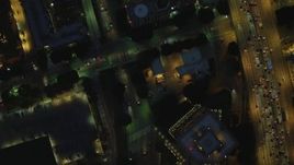 4K aerial stock footage of bird's eye view flying between Highway 110 and North Figueroa, Downtown, Los Angeles, California, night Aerial Stock Footage | DCA07_045