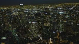 4K aerial stock footage of flying by Downtown skyscrapers, Los Angeles, California, night Aerial Stock Footage | DCA07_055