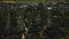 4K aerial stock footage of flying by Downtown skyscrapers, Los Angeles, California, night Aerial Stock Footage | DCA07_056