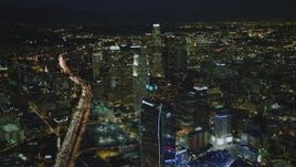 4K aerial stock footage of The Ritz-Carlton, skyscrapers, Highway 110, Los Angeles, California, night Aerial Stock Footage | DCA07_059