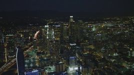 4K aerial stock footage of flying by Downtown Los Angeles skyscrapers, Los Angeles, California, night Aerial Stock Footage | DCA07_060