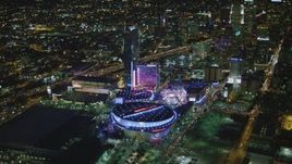 4K aerial stock footage of Staples Center, The Ritz-Carlton, JW Marriott, Nokia Theater, LA Live, Downtown Los Angeles, California, night Aerial Stock Footage | DCA07_062