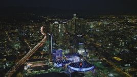 4K aerial stock footage of Staples Center, The Ritz-Carlton, Nokia Theater, LA Live and skyscrapers, Downtown Los Angeles, California, night Aerial Stock Footage | DCA07_063