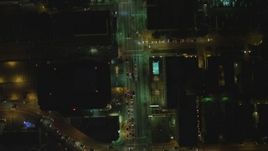 4K aerial stock footage of following Wilshire Blvd from Irolo Street to South Harvard Blvd, Koreatown, Los Angeles, California, night Aerial Stock Footage | DCA07_068