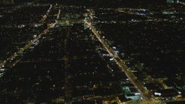 4K aerial stock footage of flying by Beverly Center, Beverly Hills, California, night Aerial Stock Footage | DCA07_080